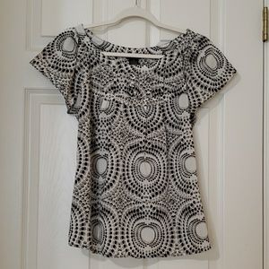 Sheer black and white print top.
